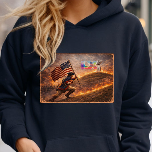 Person wearing a navy hoodie with a graphic design on a snowy street